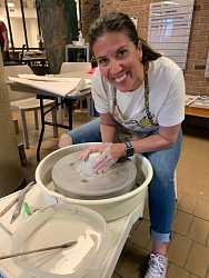 Photo of Jill Cameron at pottery wheel