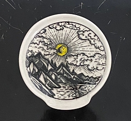 Pottery with mountain scene