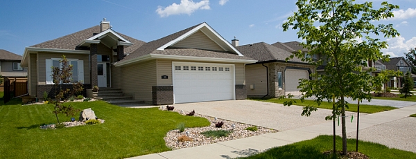 Picture of a house with words St. Albert Landscape