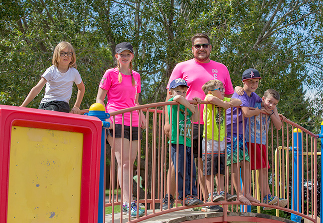 Kids playing on playground equipment