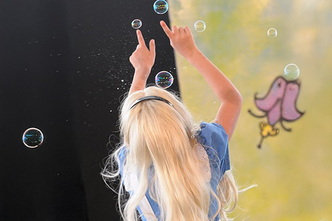 Alice popping bubbles