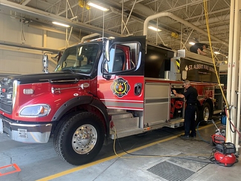 Black and red fire truck with the St. Albert Fire Services emblem on the door.