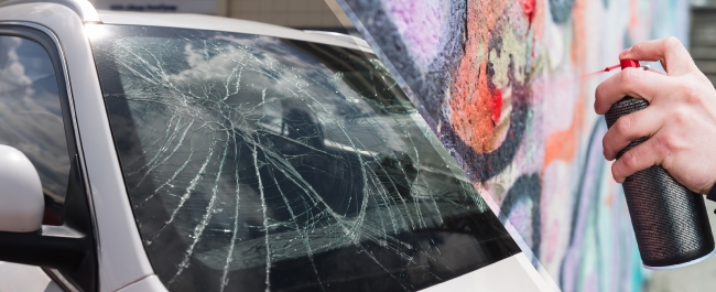 A split collage showing a smashed car window and graffiti