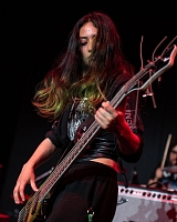 Musician playing bass guitar