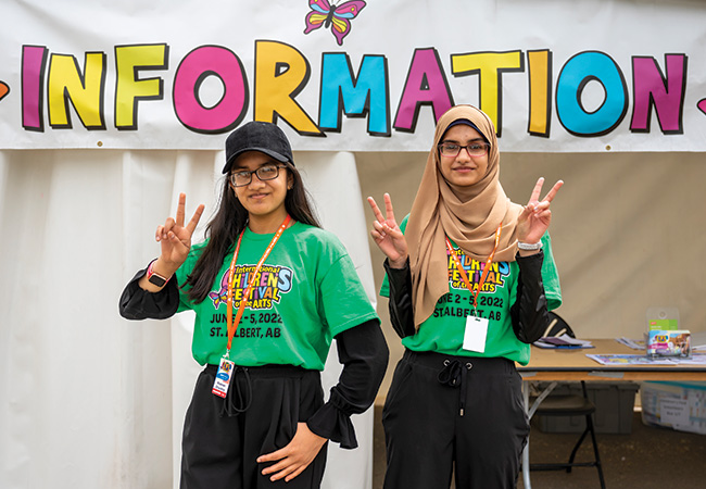Two Children's Festival volunteers
