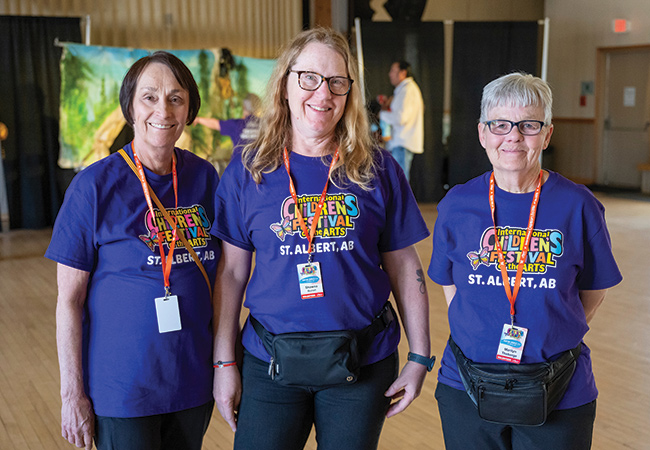 Three Children's Festival volunteers