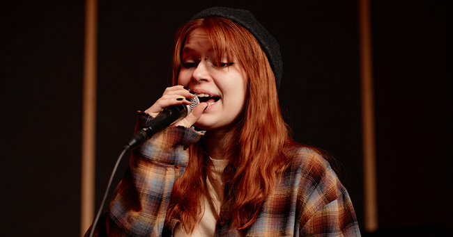 Girl talking into a mic