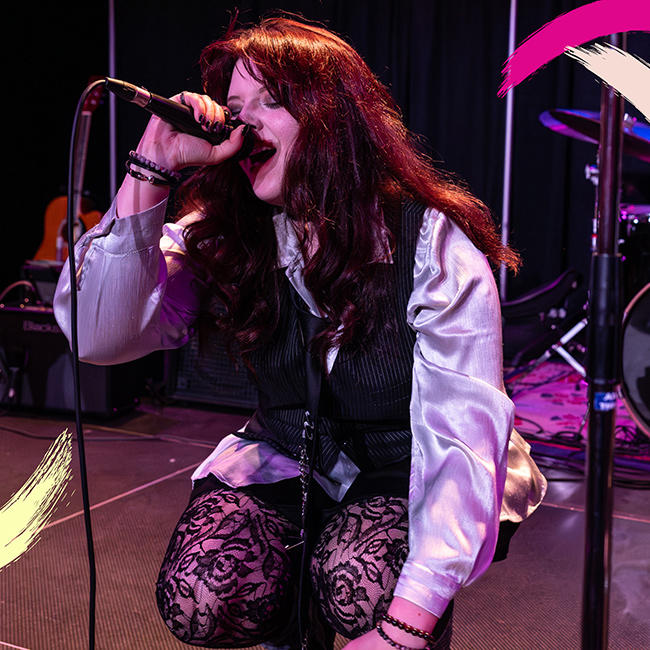 Musician on stage singing