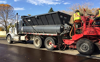 Vehicles perparing to pave